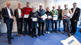 
Toll Collect Mitarbeitende bei einer Jubiläumsfeier